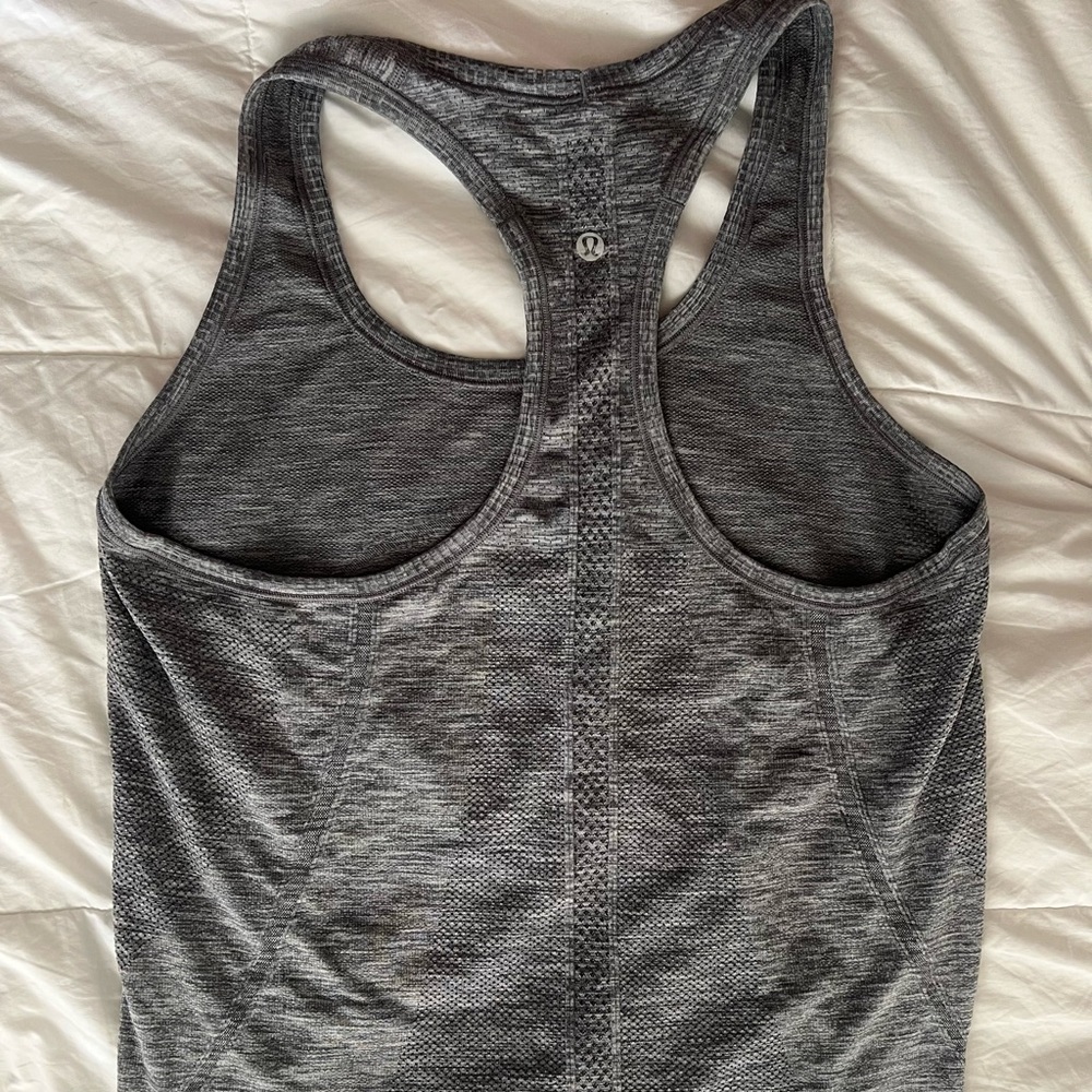 Lululemon Swiftly Tech hip length racer back tank size 12